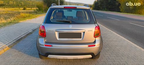 Suzuki SX4 2011 серебристый - фото 6