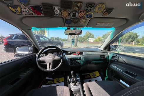 Mitsubishi Lancer 2009 - фото 21