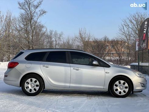 Opel Astra 2011 - фото 22