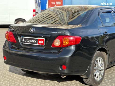 Toyota Corolla 2008 черный - фото 8