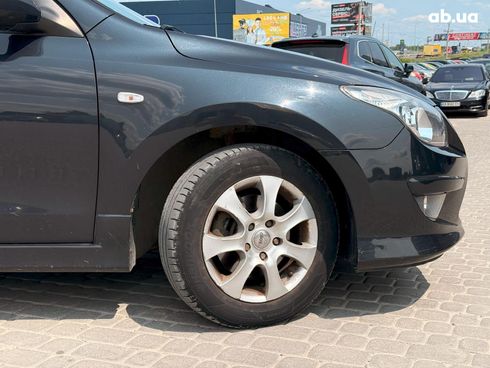 Hyundai i30 2010 черный - фото 5
