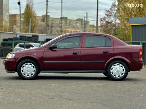 Opel Astra 2006 красный - фото 8