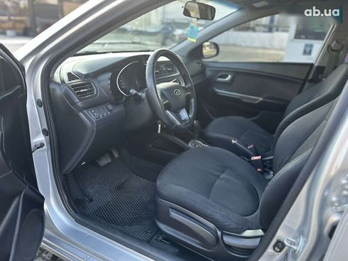 Kia Rio 2012 - фото 11