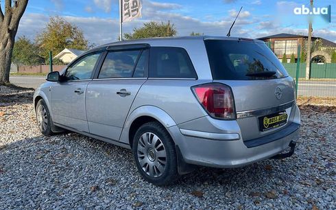 Opel Astra 2010 - фото 7