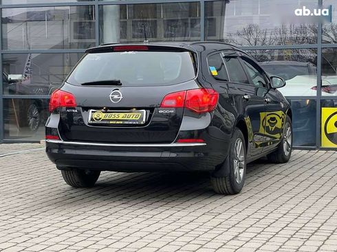 Opel Astra 2015 - фото 7