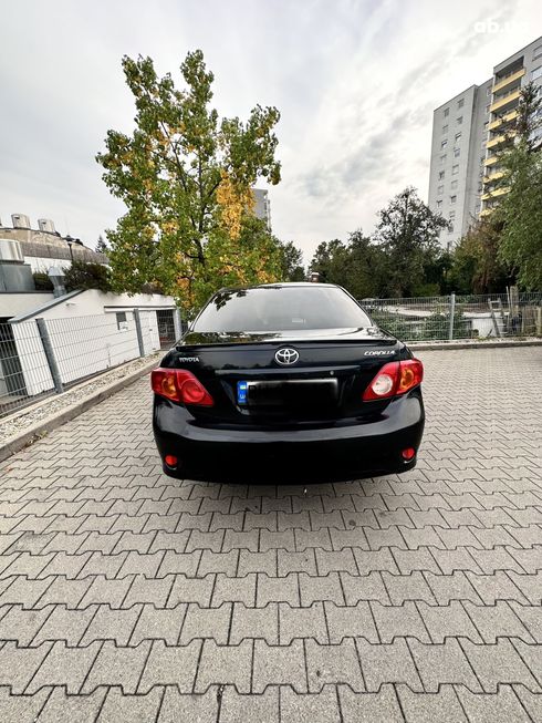 Toyota Corolla 2008 черный - фото 4