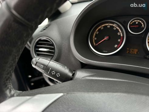 Opel Corsa 2010 - фото 26