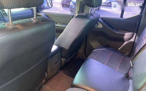 Nissan Navara 2011 - фото 18
