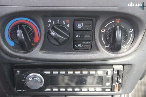Nissan Almera 2005 - фото 22