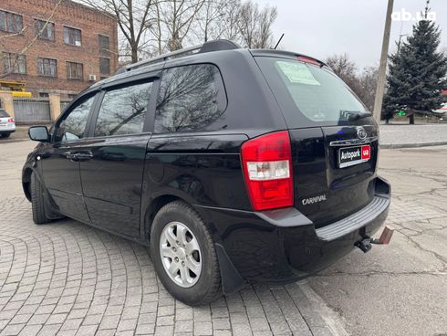 Kia Carnival 2008 черный - фото 3