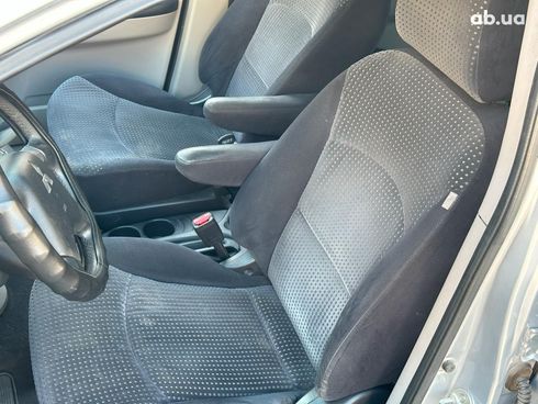Mitsubishi Grandis 2007 серый - фото 25