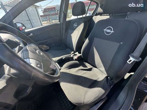 Opel Astra 2012 - фото 17