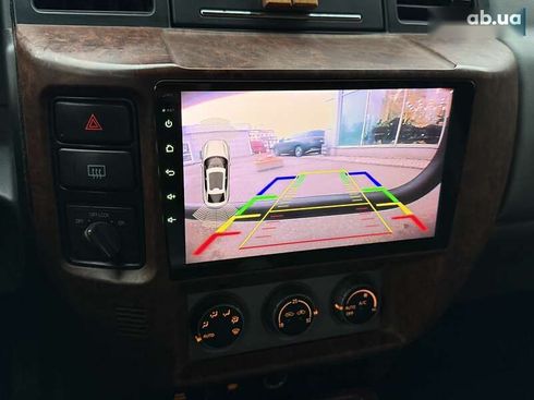 Nissan Patrol 2005 - фото 21
