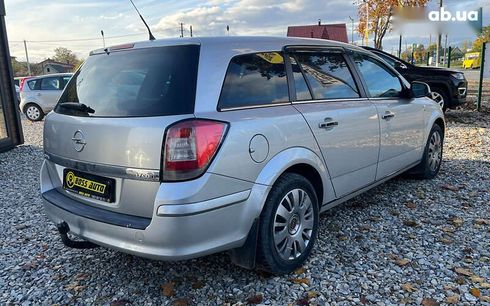 Opel Astra 2010 - фото 5