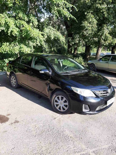 Toyota Corolla 2010 черный - фото 4