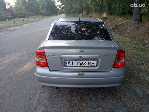 Opel Astra G 2008 серебристый - фото 12