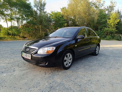 Kia Cerato 2007 черный - фото 6