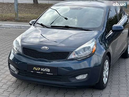 Kia Rio 2013 - фото 9