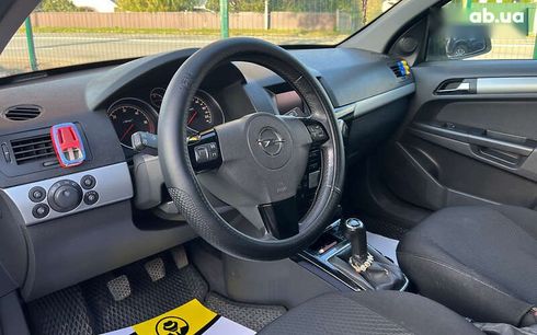 Opel Astra 2010 - фото 8