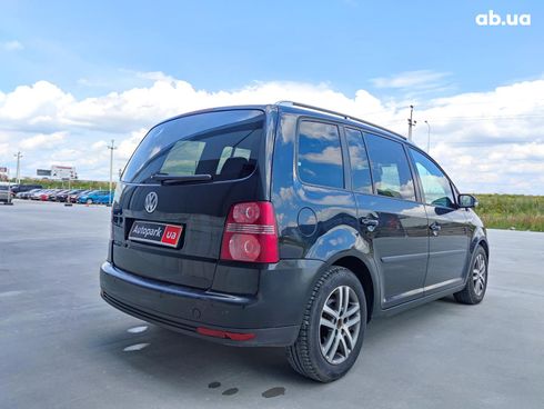 Volkswagen Touran 2010 черный - фото 13