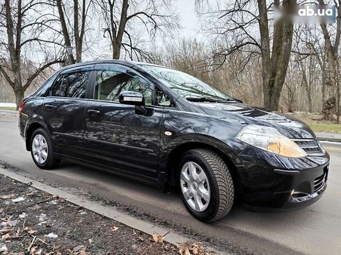 Nissan Tiida 2012 - фото 29