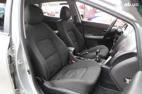 Kia Cee'd 2014 - фото 11