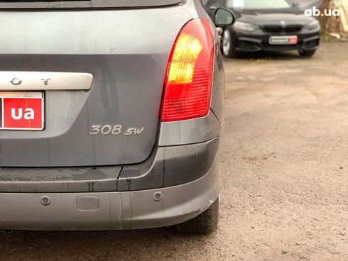 Peugeot 308 2010 серый - фото 35