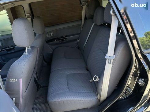 Kia Carens 2003 - фото 27