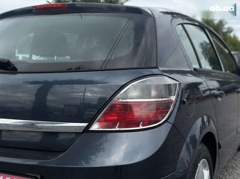 Opel Astra 2008 - фото 16