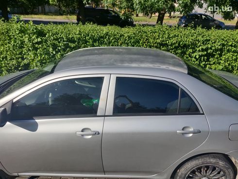 Toyota Corolla 2008 серебристый - фото 7