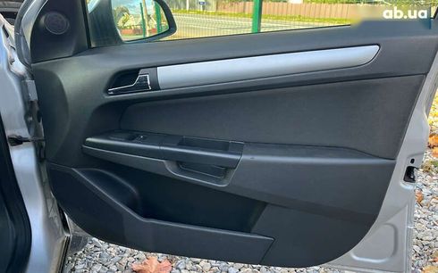 Opel Astra 2010 - фото 27