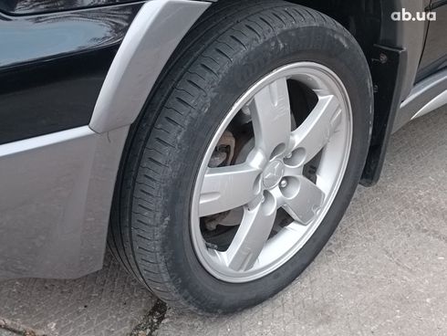 Mitsubishi Outlander 2005 черный - фото 4