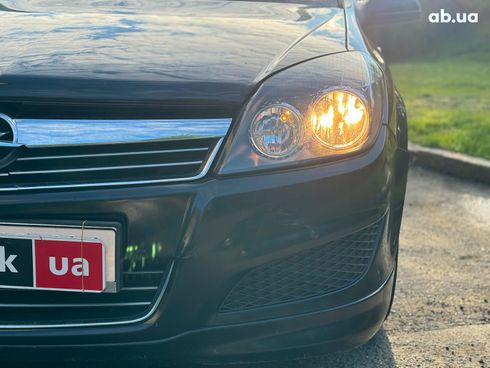 Opel Astra 2009 черный - фото 10