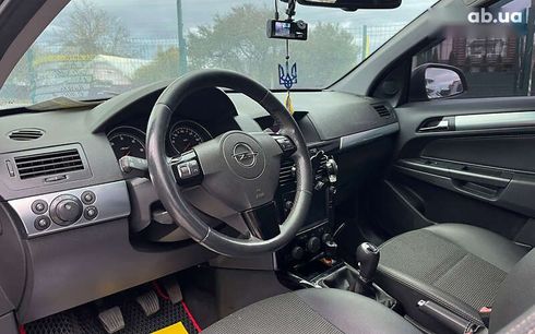 Opel Astra 2010 - фото 7