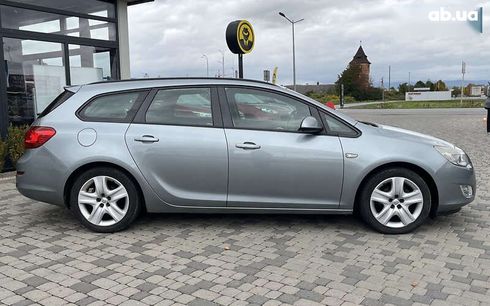Opel Astra 2011 - фото 8