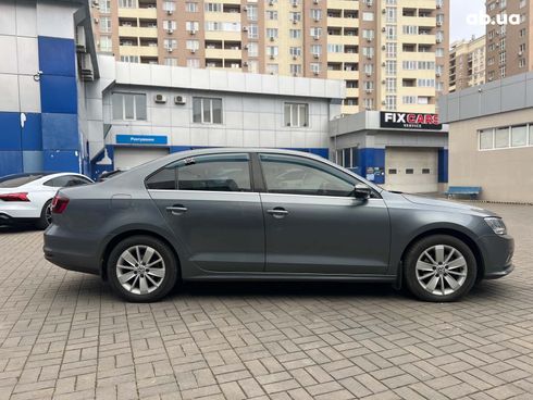 Volkswagen Jetta 2016 серый - фото 7