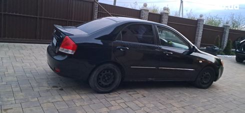 Kia Cerato 2007 черный - фото 5