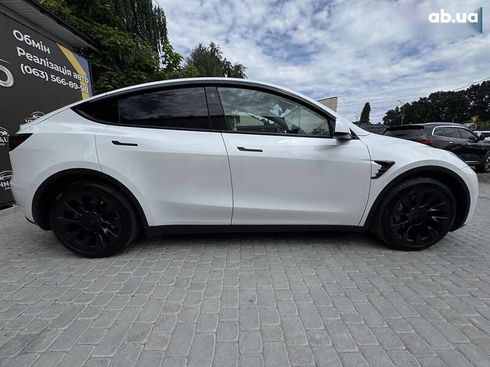 Tesla Model Y 2024 - фото 19