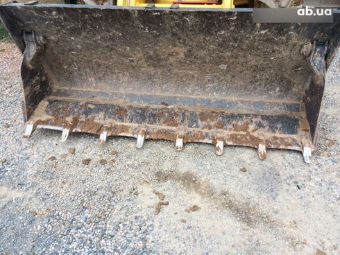 Komatsu WB 2007 - фото 16