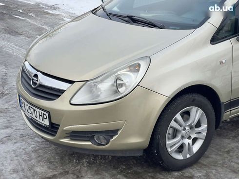 Opel Corsa 2008 - фото 13