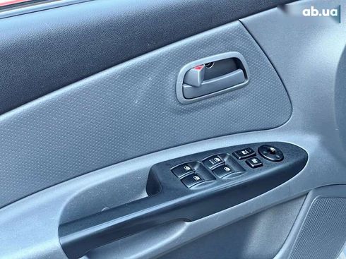 Kia Rio 2011 - фото 21