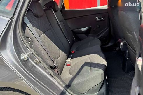 Kia Rio 2012 - фото 11