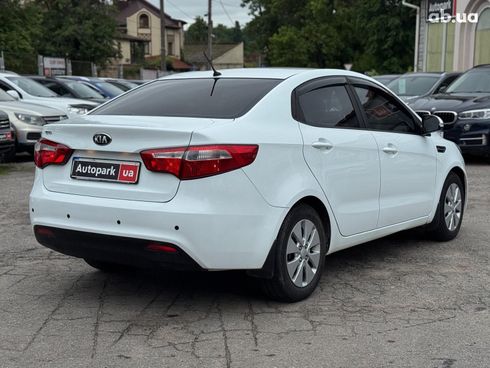 Kia Rio 2013 белый - фото 11