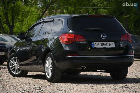 Opel Astra 2014 - фото 7