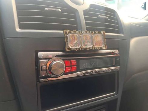Nissan Almera 2007 - фото 20