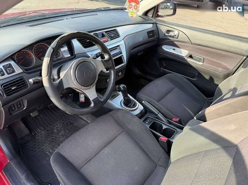 Mitsubishi Lancer 2006 - фото 19