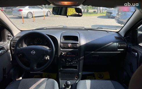 Opel Astra 2008 - фото 11