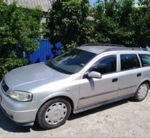 Opel Astra G 1999 серебристый - фото 3