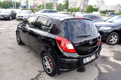 Opel Corsa 2008 - фото 10