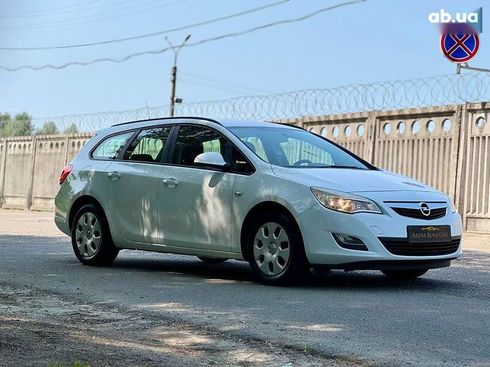 Opel Astra 2011 - фото 5